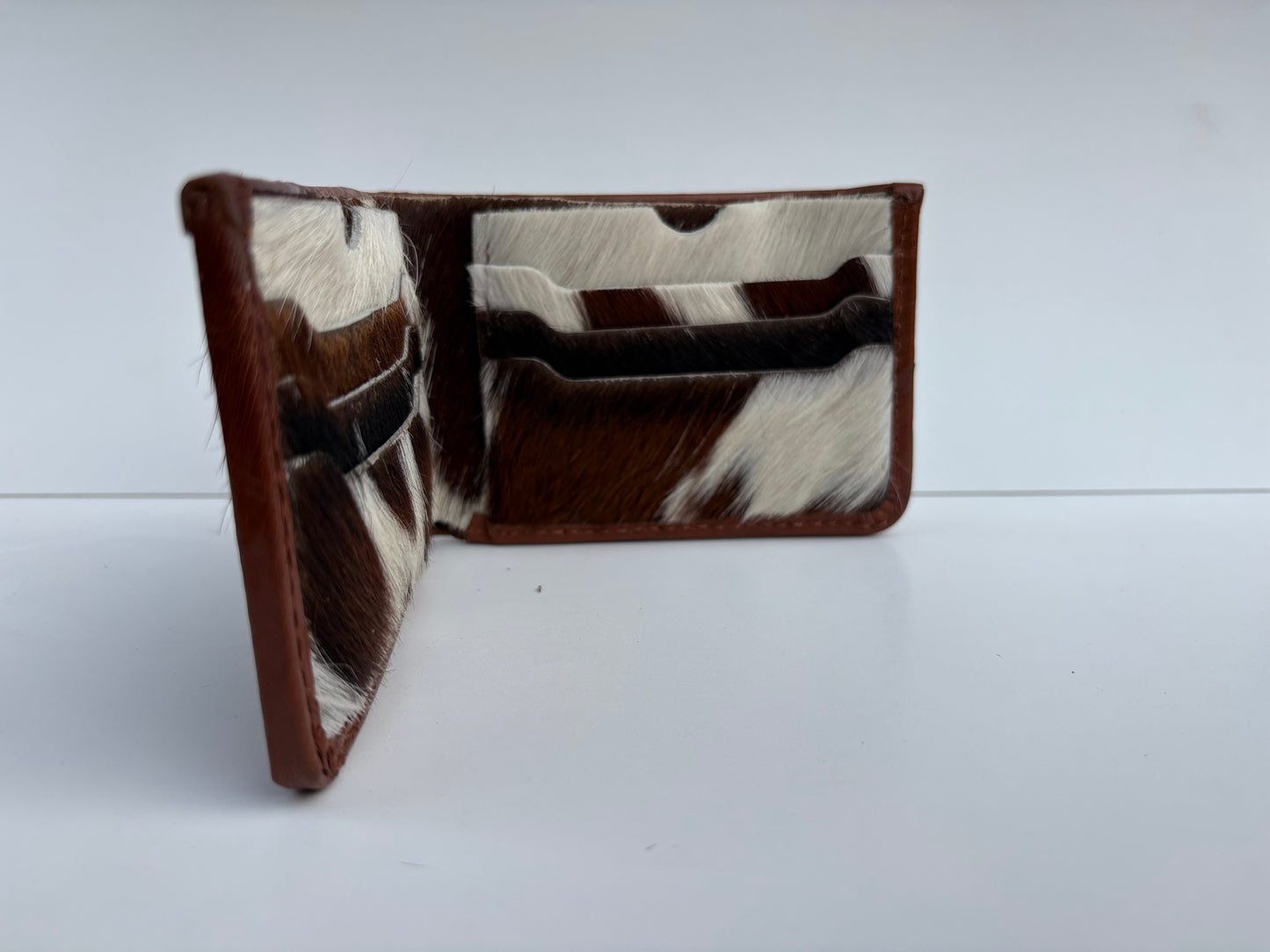 Bi Fold Full Hair-on Goat Skin Wallet | Carries Essentials with Style.