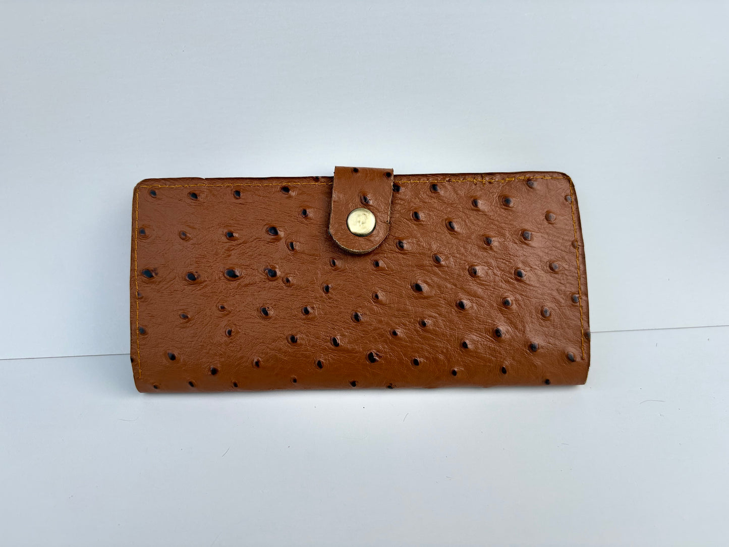 Long Ostrich Skin Wallet | Exotic, Smooth Texture, Timeless Elegance.