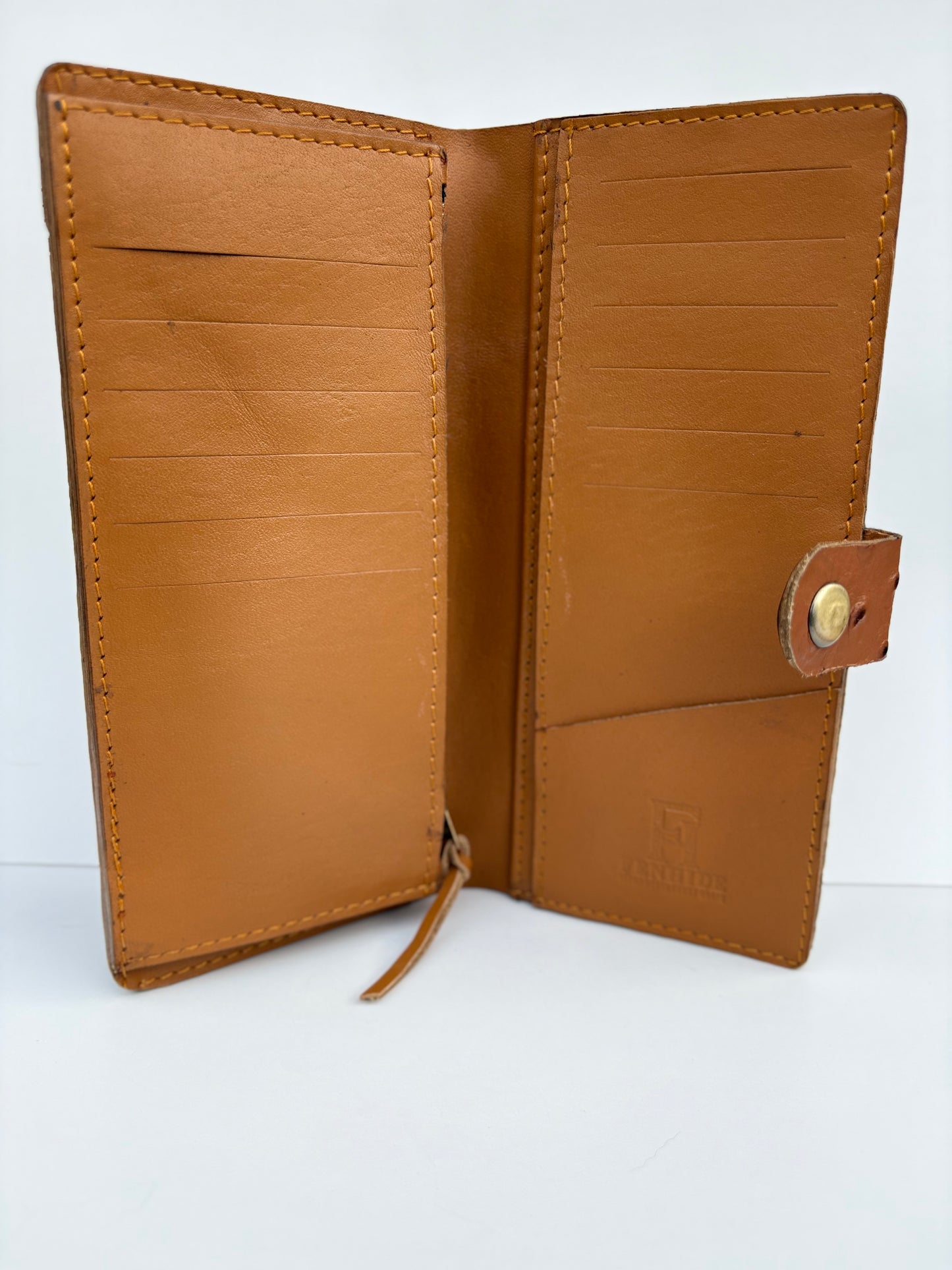 Long Ostrich Skin Wallet | Exotic, Smooth Texture, Timeless Elegance.